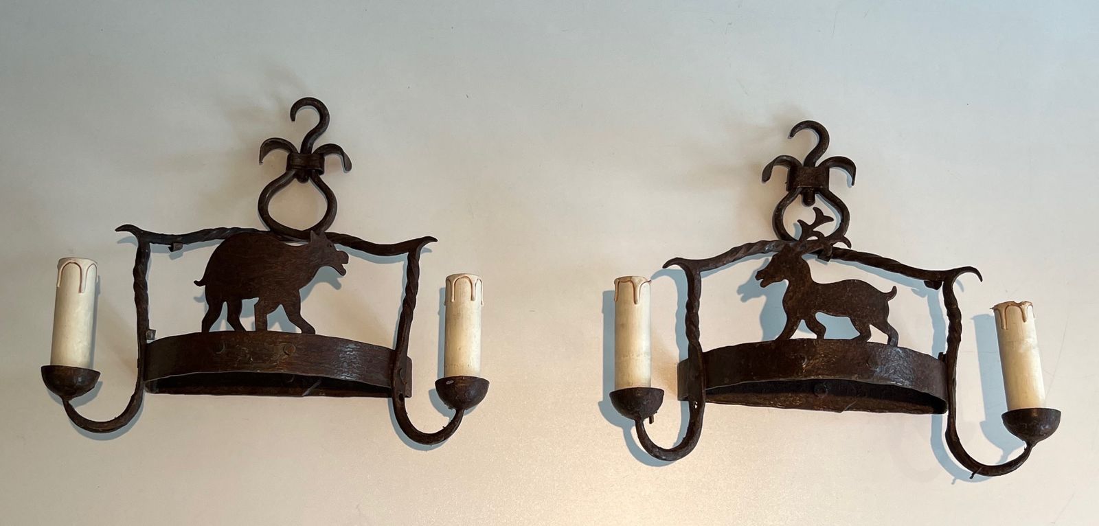 Home Decor Pair Of Wrought Iron Wall Sconces Depicting Animals photo