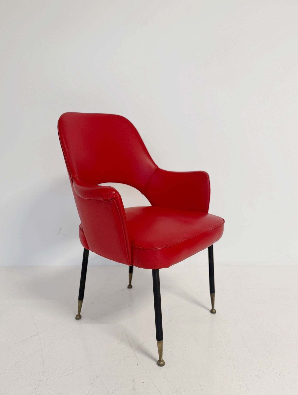 1950s Italian Armchair In Red Vinyl, With A Contoured Back And Open Back.
