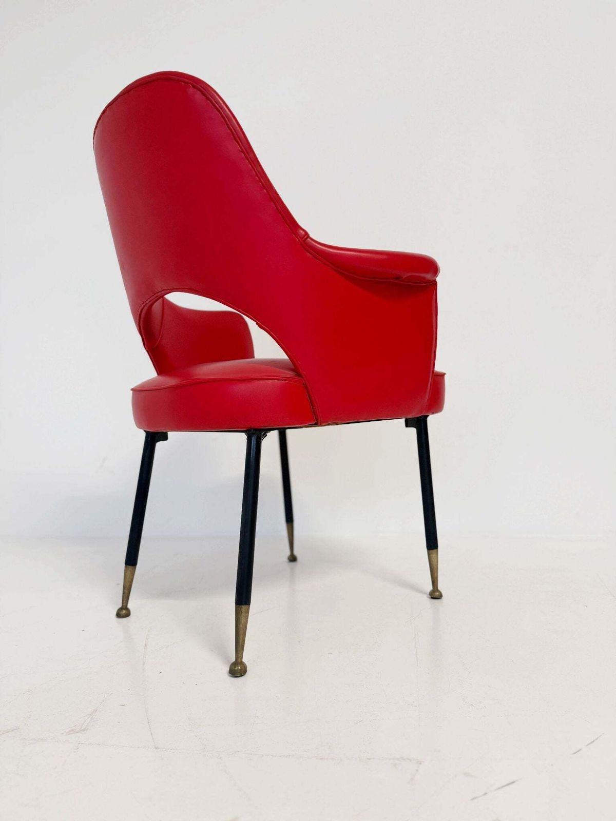 1950s Italian Armchair In Red Vinyl, With A Contoured Back And Open Back. photo furniture