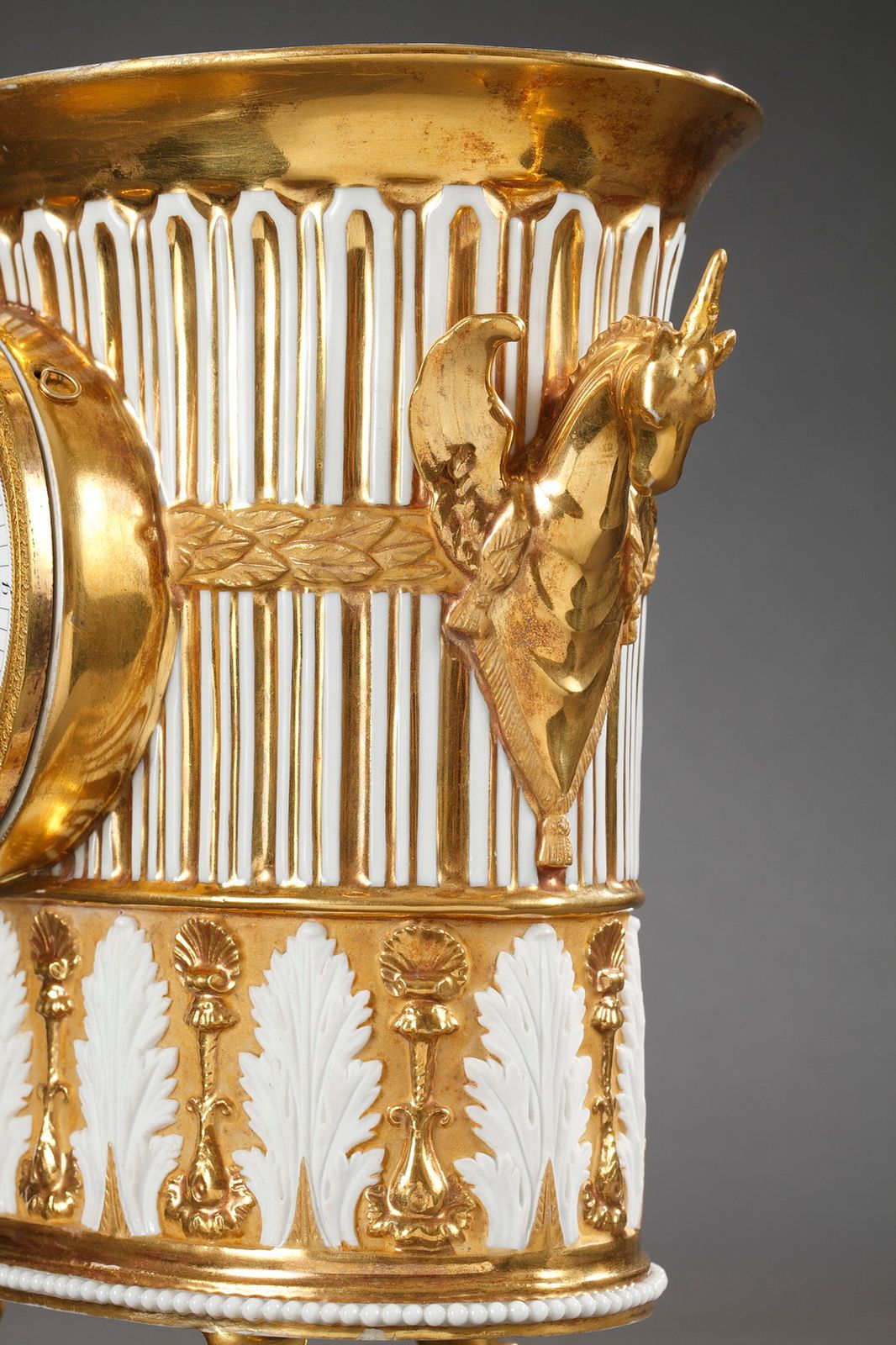 photo furniture Gilt Porcelain Clock In The Shape Of A Vase, Early 19th Century