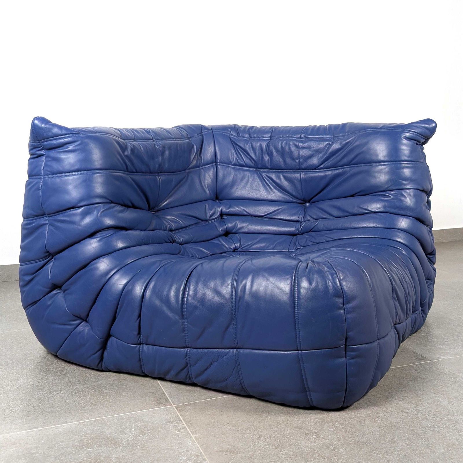 photo buy Michel Ducaroy Ligne Roset Togo Corner Sofa, French Blue Leather, 1980s