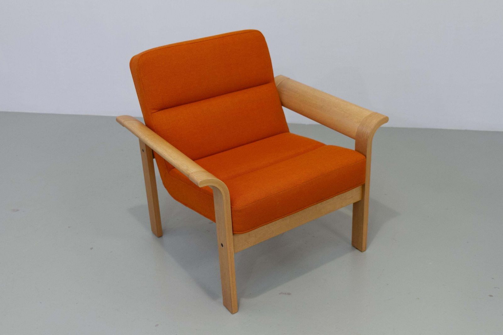 Danish Orange Oak Botium Lounge Chair By Magnus Olesen, 1970s. photo for sale
