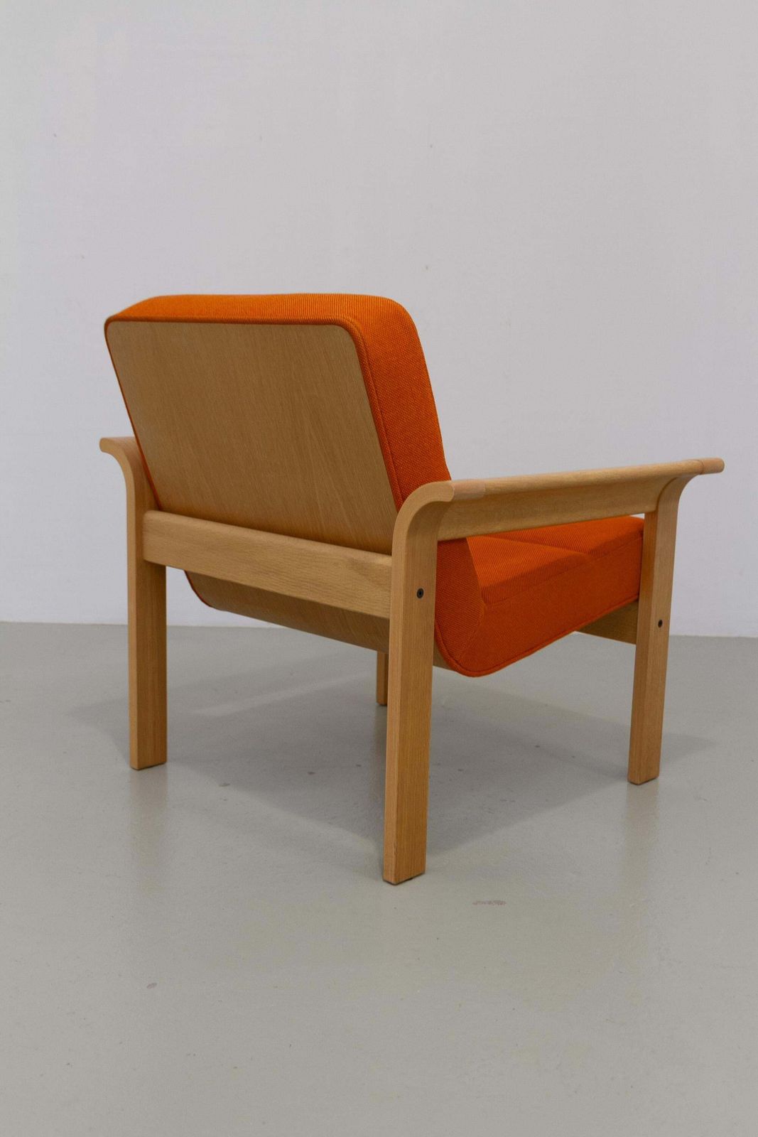Furniture Danish Orange Oak Botium Lounge Chair By Magnus Olesen, 1970s. photo