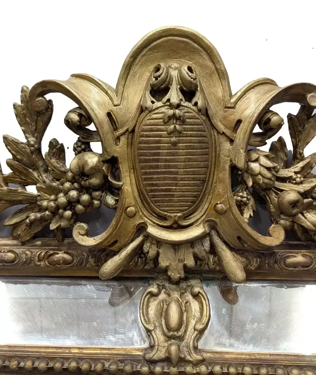 Large Mirror With Enclosed Panels Decorated With A Coat Of Arms photo Home Decor