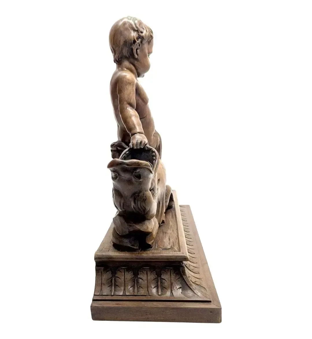 Wooden Sculpture Of A Baby Leaning Against An Animal, 19th Century photo for sale