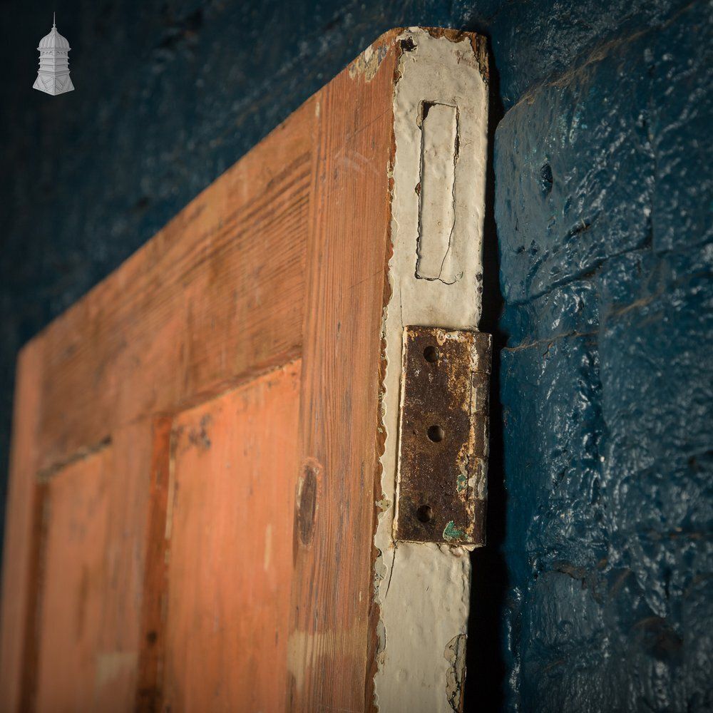 photo vintage Four Panel Door, White And Orange Distressed Paint