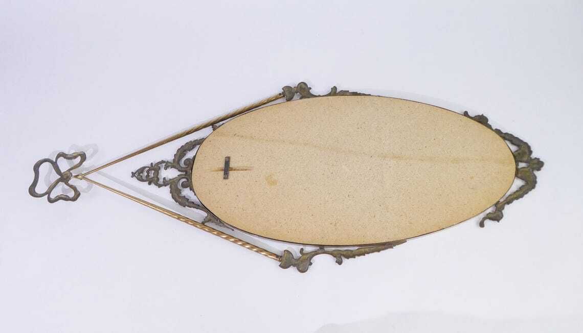 photo furniture Large Oval Italian Brass Wall Mirror With Ornament  Bow Tie Hollywood Regency Mirror  Wall Hanging
