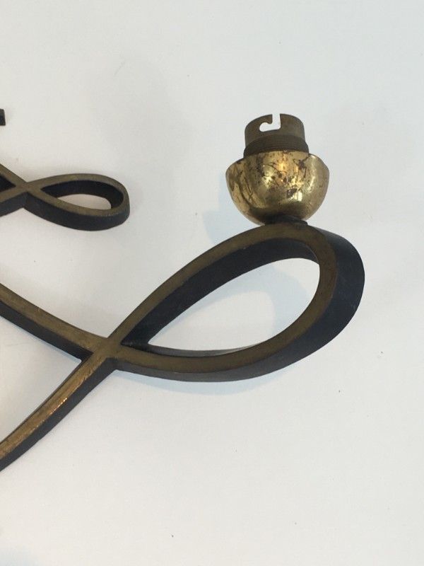 In The Style Of Jules Leleu. Pair Of Black Lacquered And Brass Design Wall Sconces. Circa 1950 photo vinterior
