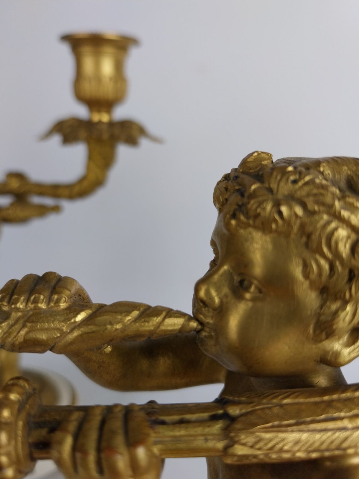 photo for sale Pair Of Gilt Bronze Cherub Candlesticks