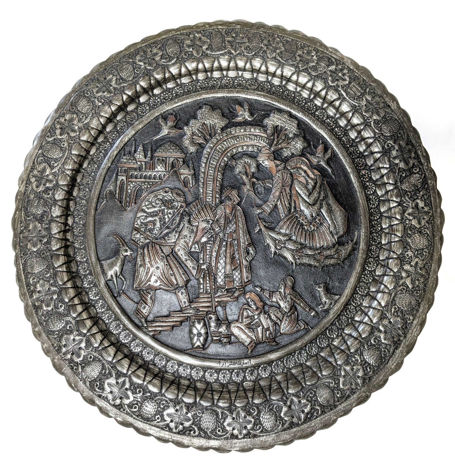 500.0 Antique Islamic Qajar Tinned Brass Charger With Intricate Hammered And Etched Scenery photo