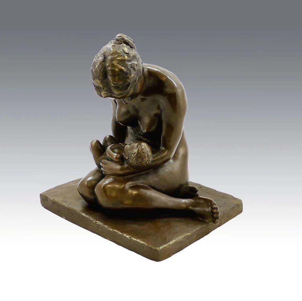 Bronze Sculpture Depicting A Mother And Her Child photo 3991.0
