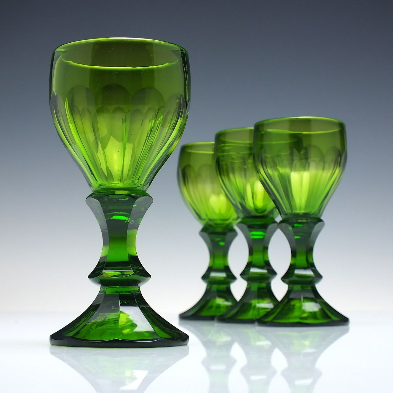 Four 19th Century Biedermeier Green Cut Wine Glasses C1840