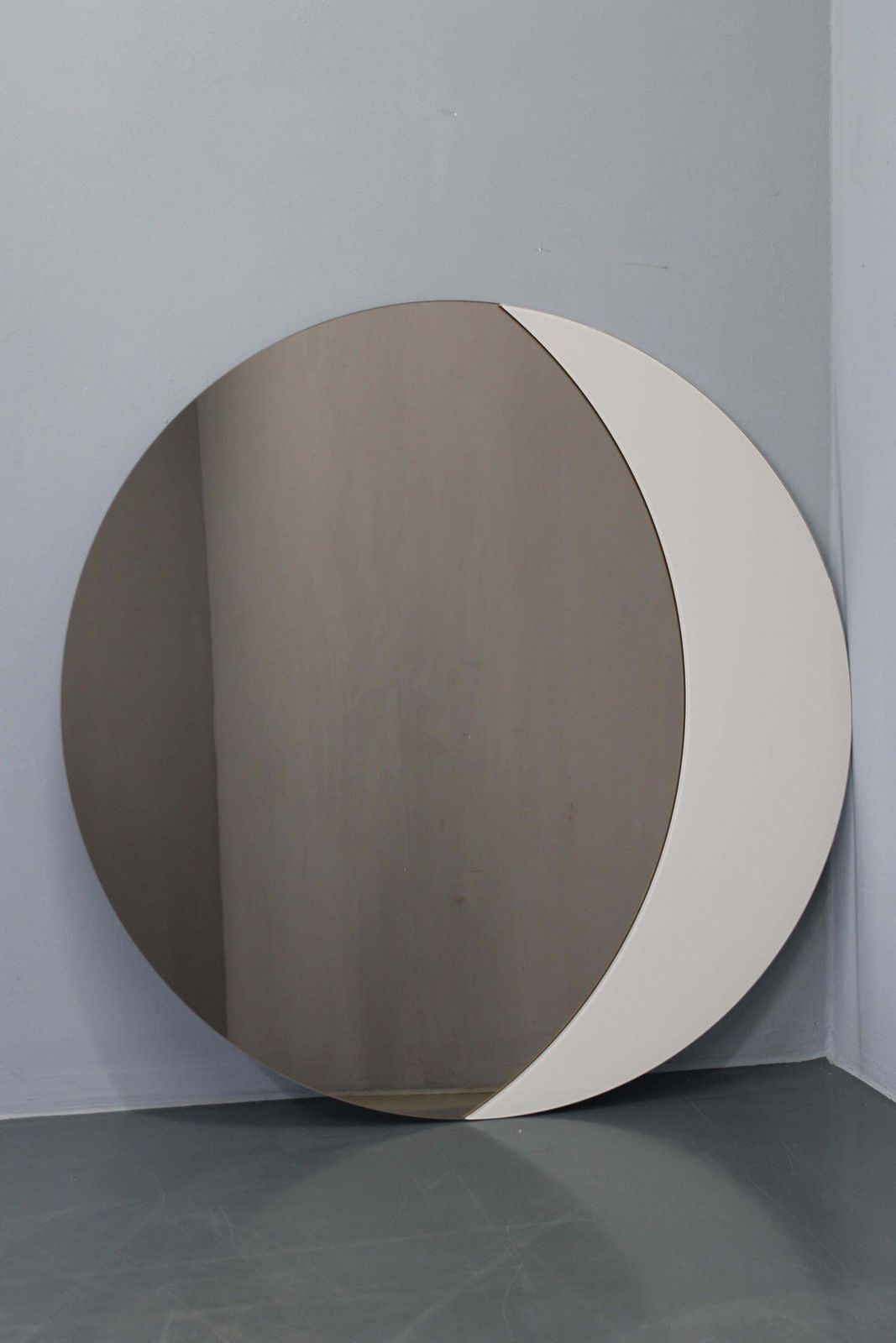 Large 1980s Italian Smoke Tinted Round Mirror With White Geometric Segment photo furniture