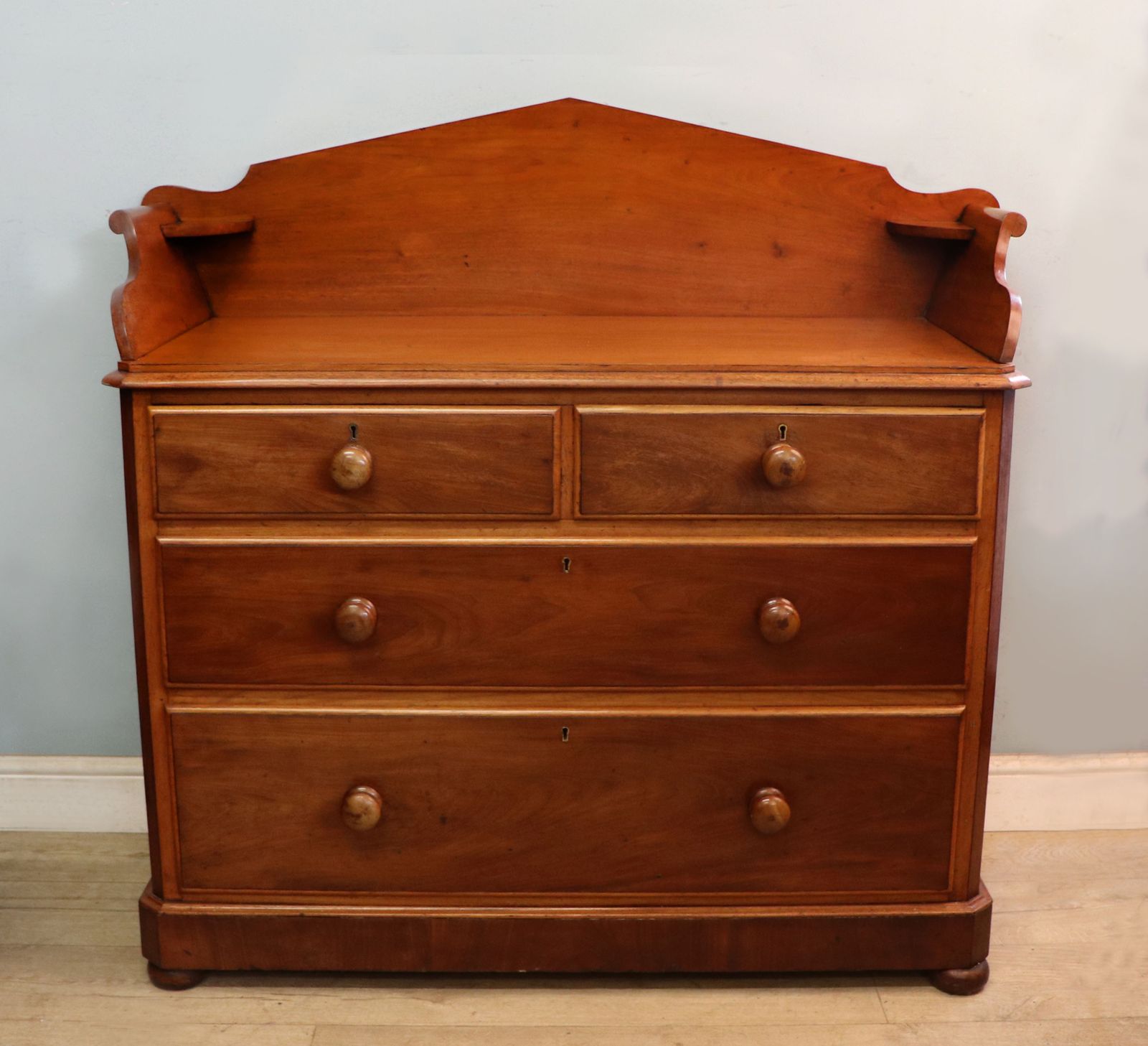 A Lovely Mid 19th Century Mahogany Galleried Back Chest Of Drawers.