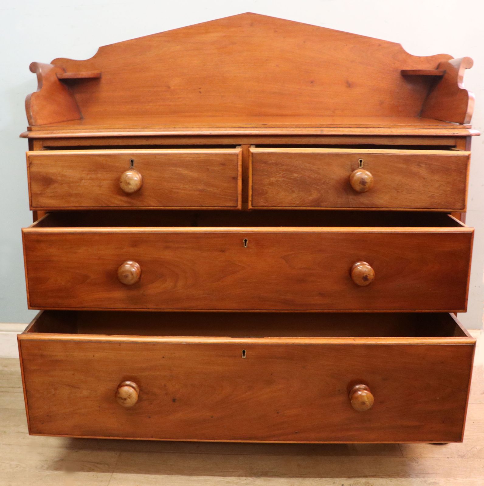 A Lovely Mid 19th Century Mahogany Galleried Back Chest Of Drawers. photo furniture