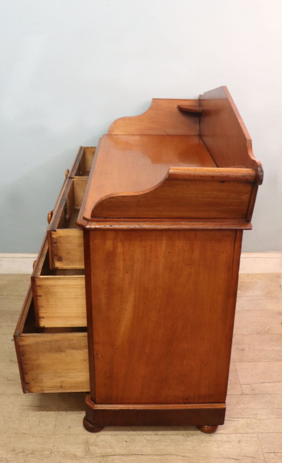 A Lovely Mid 19th Century Mahogany Galleried Back Chest Of Drawers. photo buy