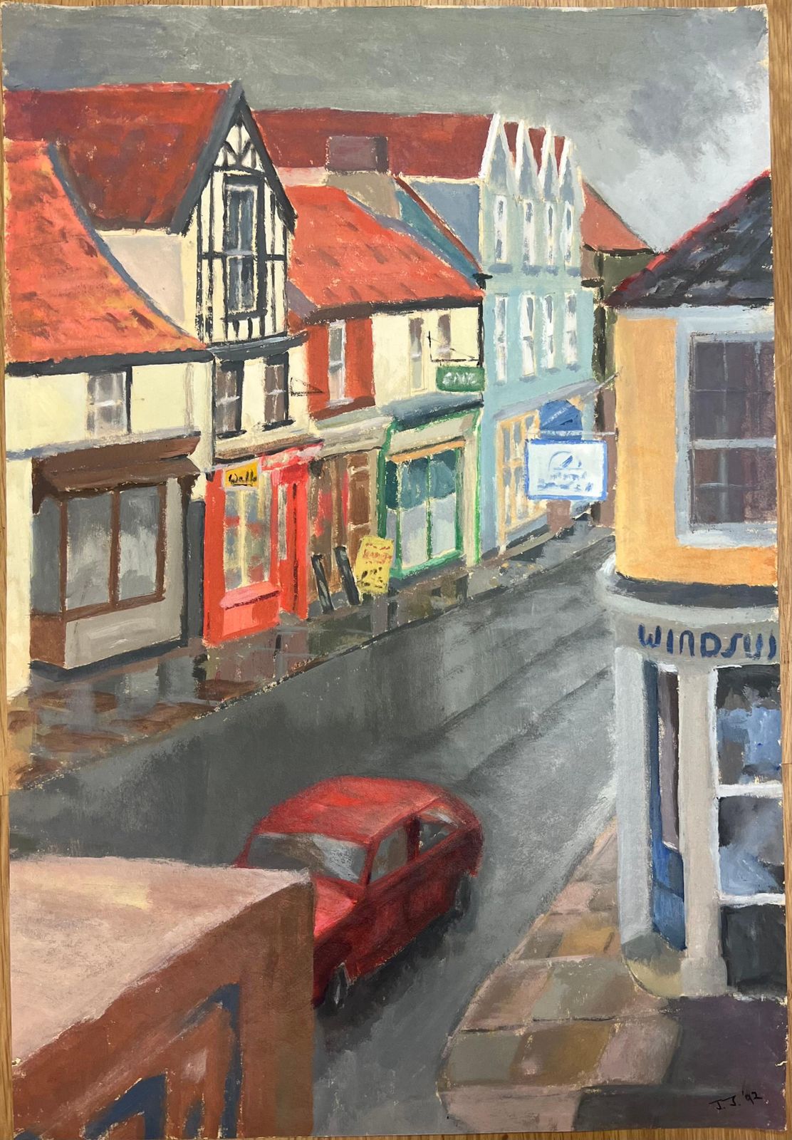 Jill Jacksonovercast Afternoon On A Quiet High Street With Red Car Driving photo furniture