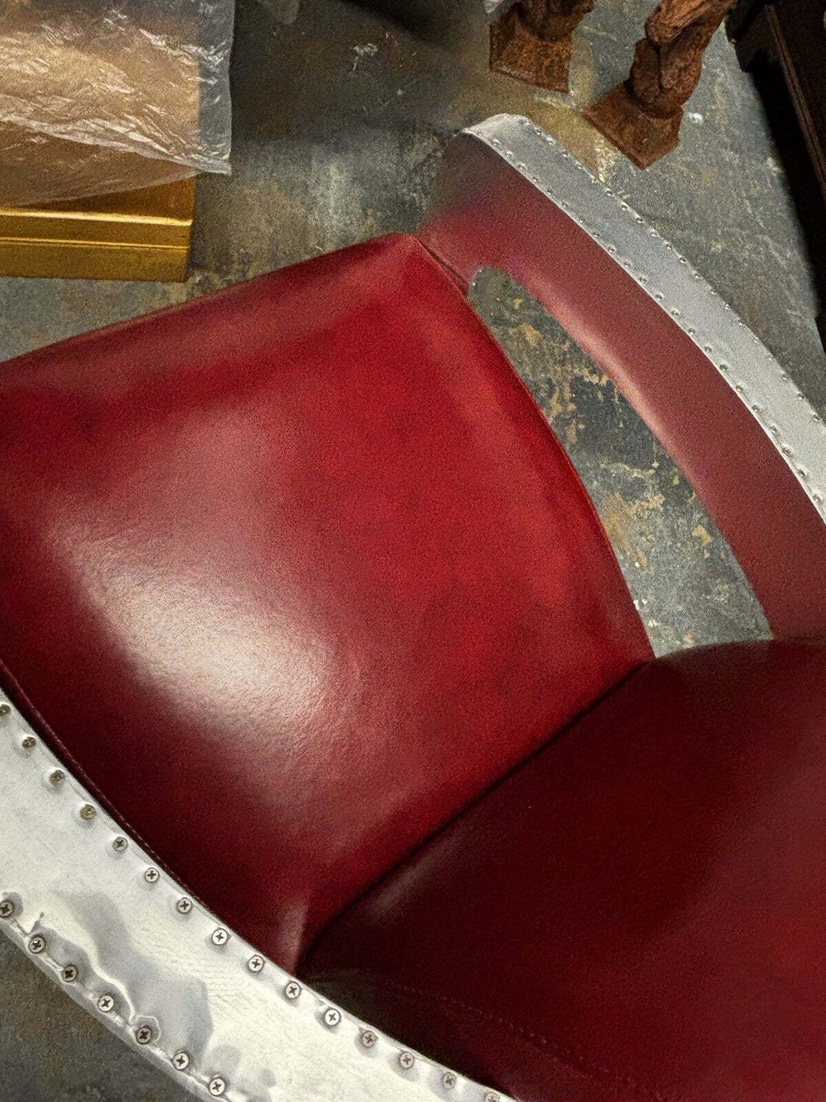 Aviators Polished Metal Armchair, With Red Leather Upholstery. photo for sale