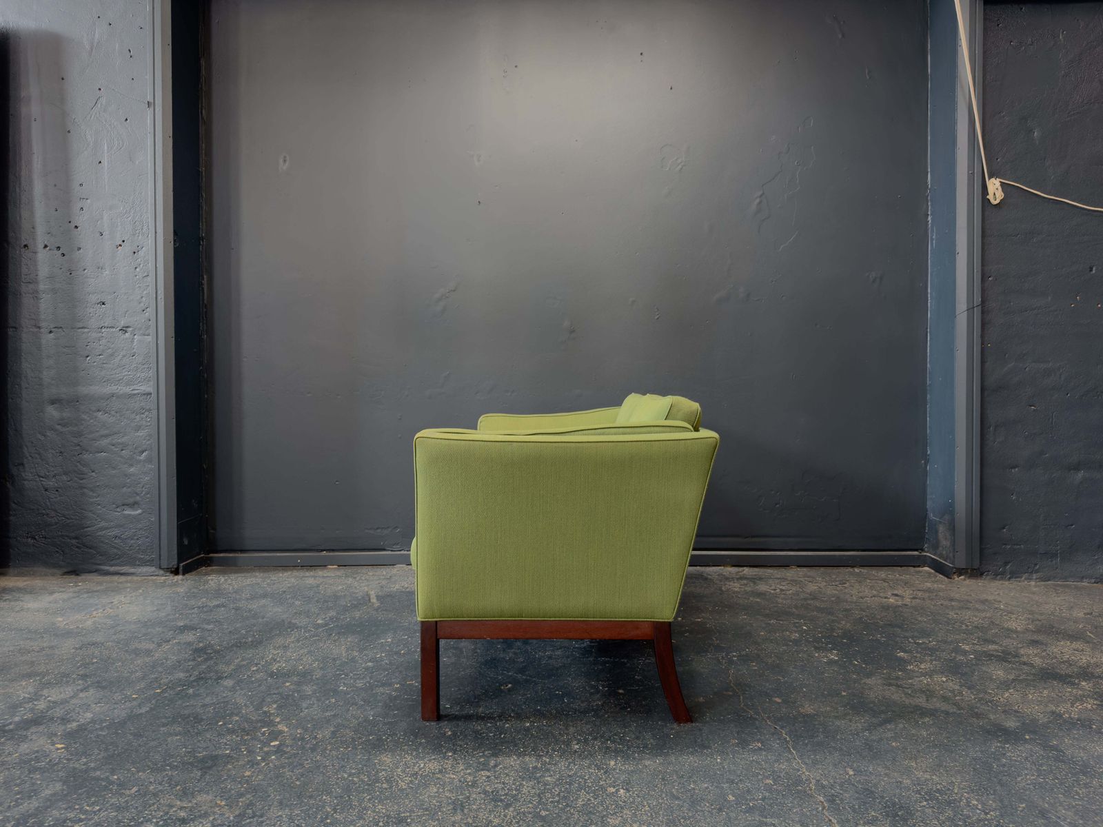 photo furniture Green Upholstered Two Seater Sofa