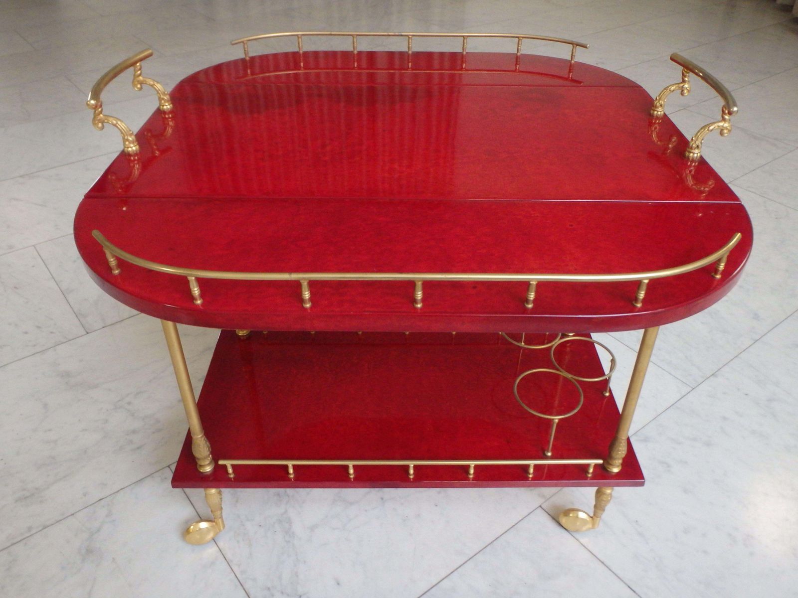 Vibrant Red Coat Skin Bar Cart By Aldo Tura With Wings To Be Opend photo Furniture