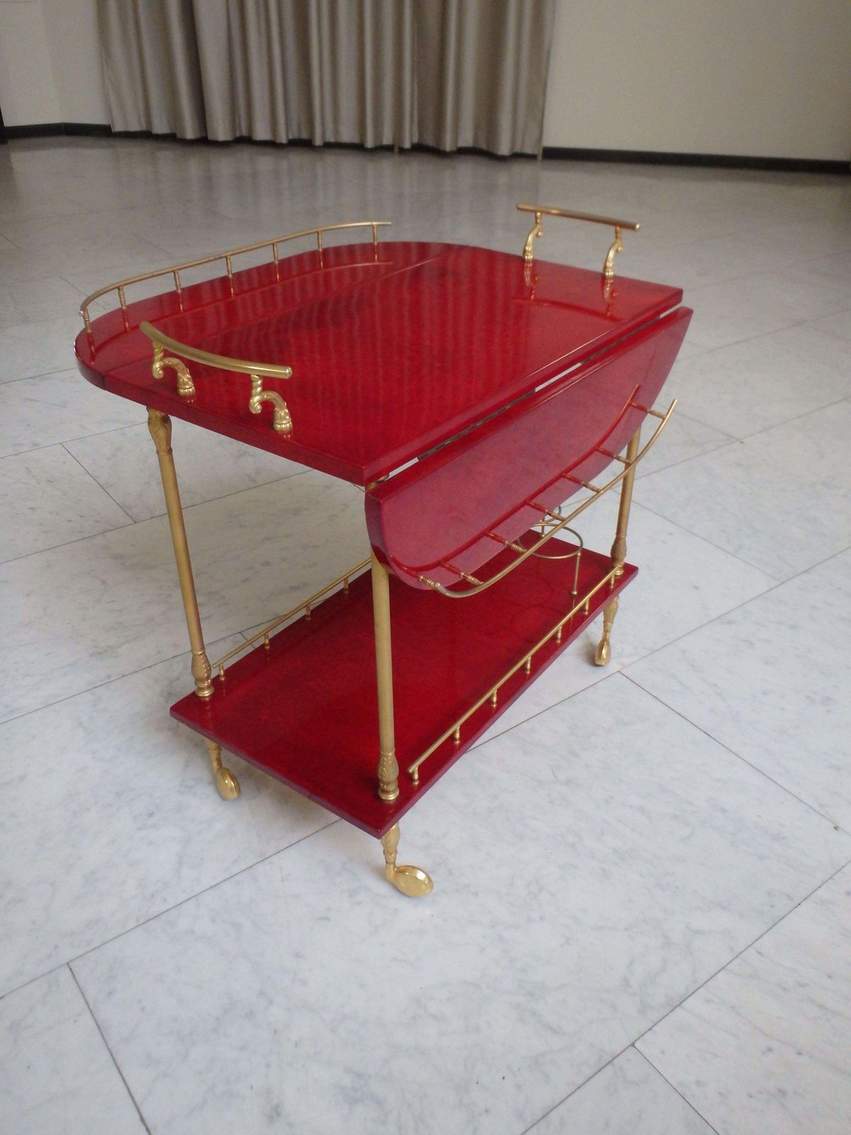 Vibrant Red Coat Skin Bar Cart By Aldo Tura With Wings To Be Opend photo buy