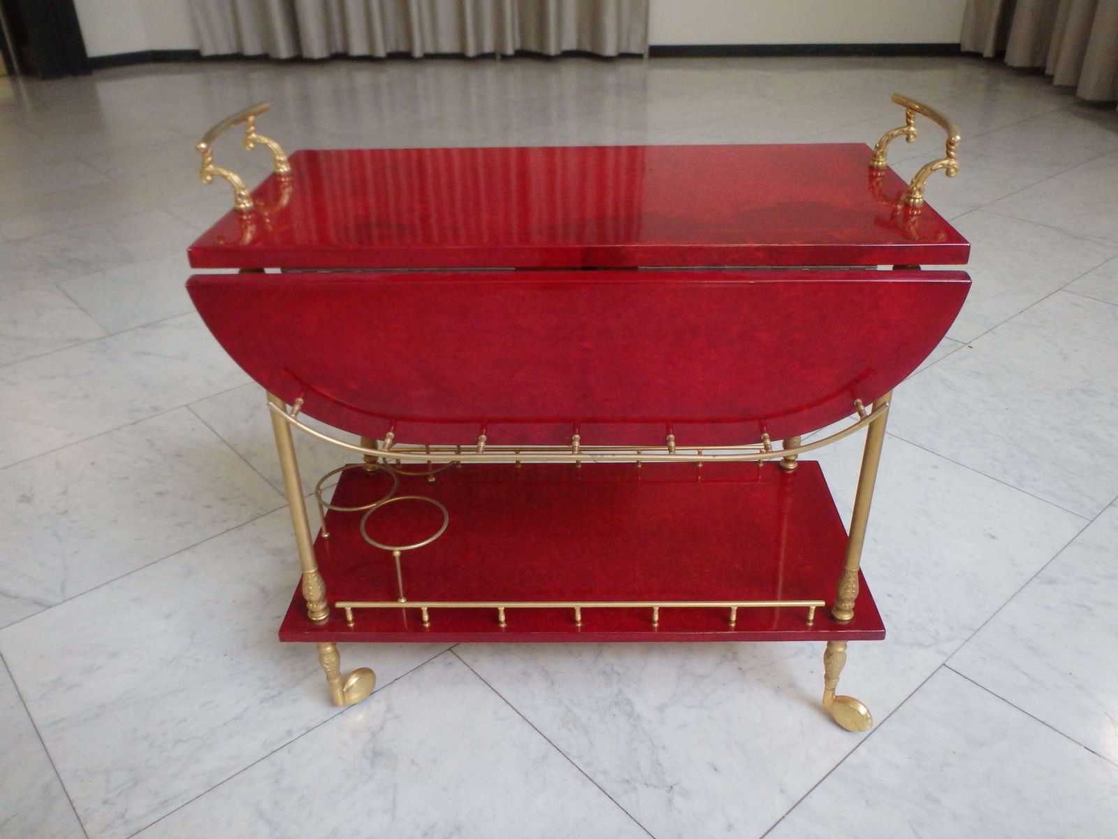 Furniture Vibrant Red Coat Skin Bar Cart By Aldo Tura With Wings To Be Opend photo