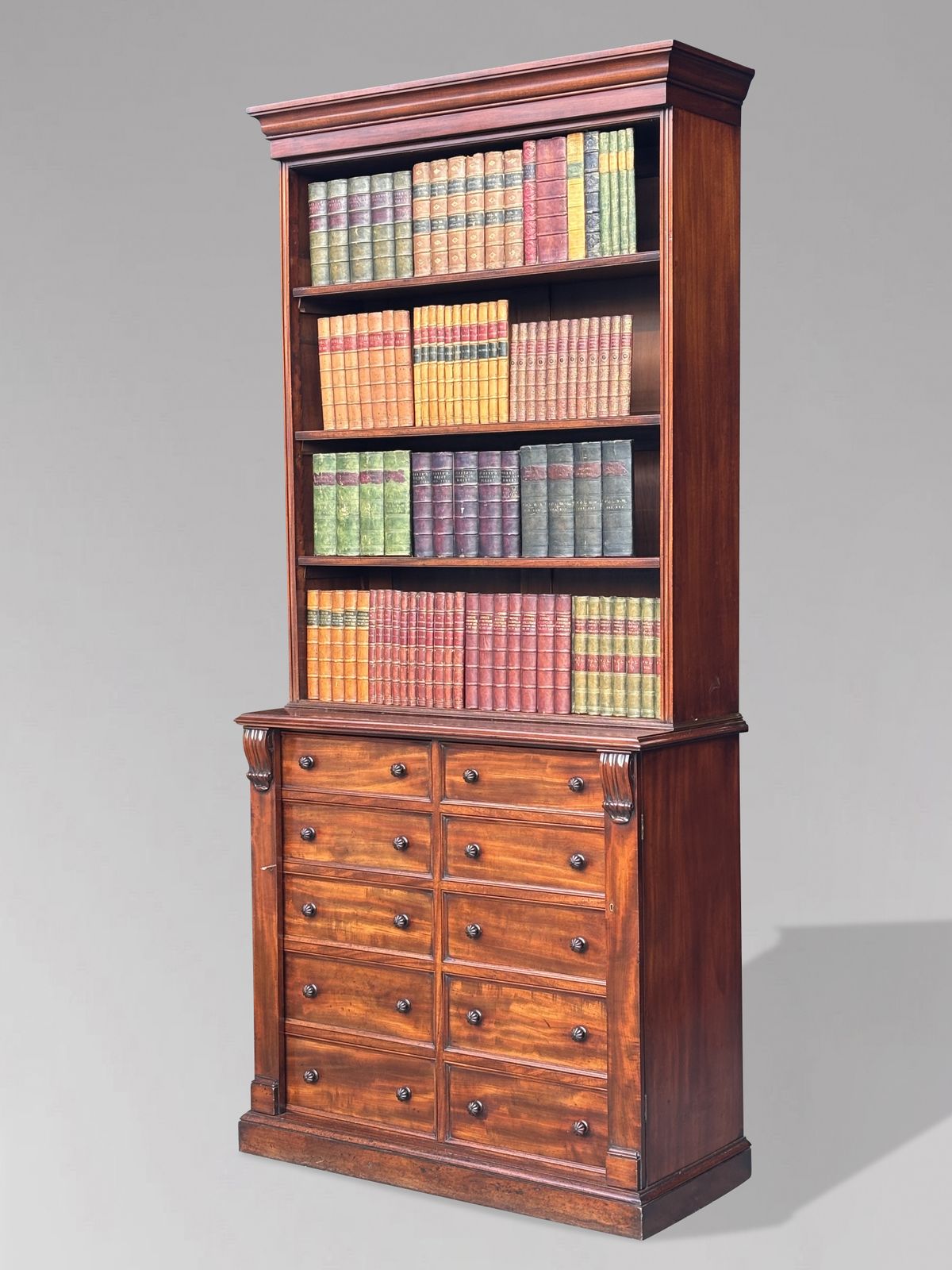 Early 19th Century Regency Period Tall Mahogany Wellington Base Open Library Bookcase