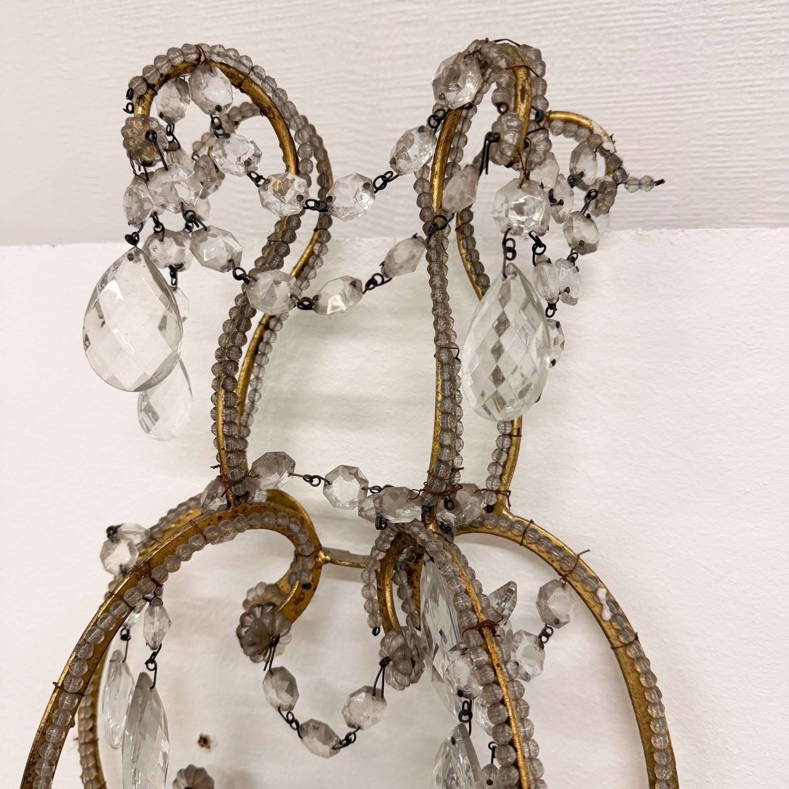 photo for sale Pair Of English Crystal And Gilt Metal Wall Sconces — 20th Century