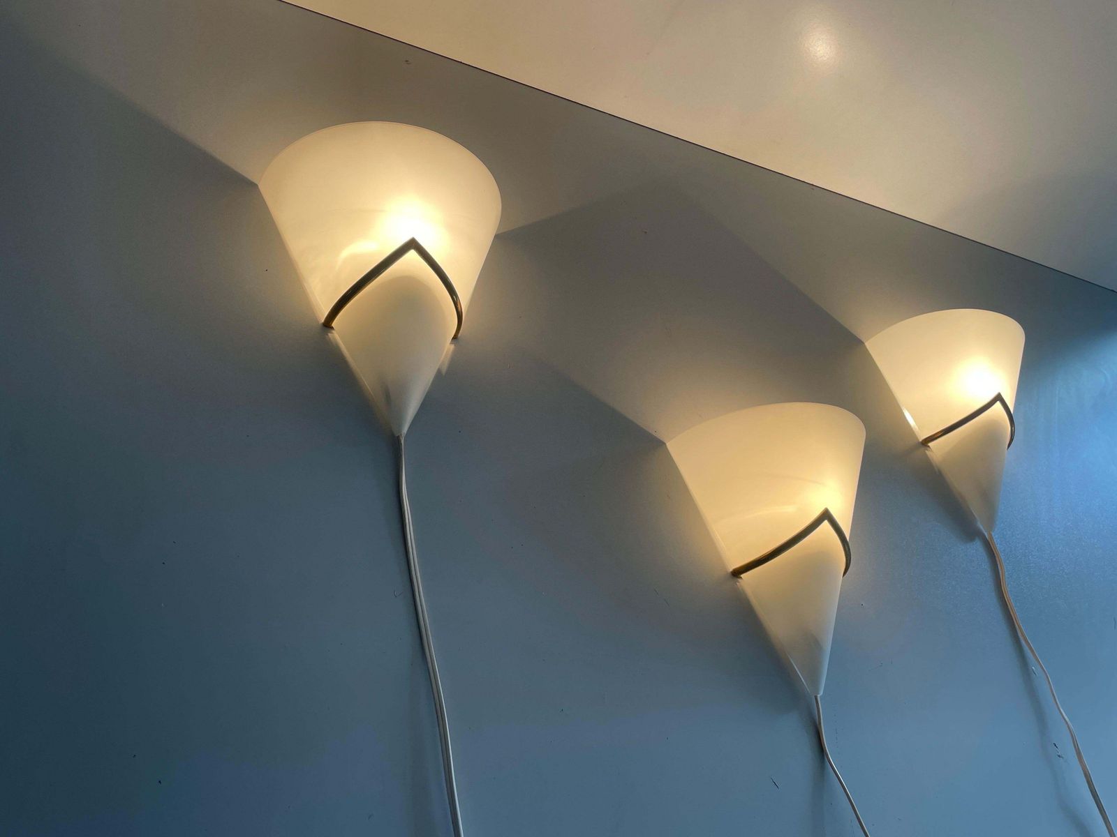 photo furniture Mid Century Opal Glass And Brass Set Of Three Sconces, 1960s, Italy