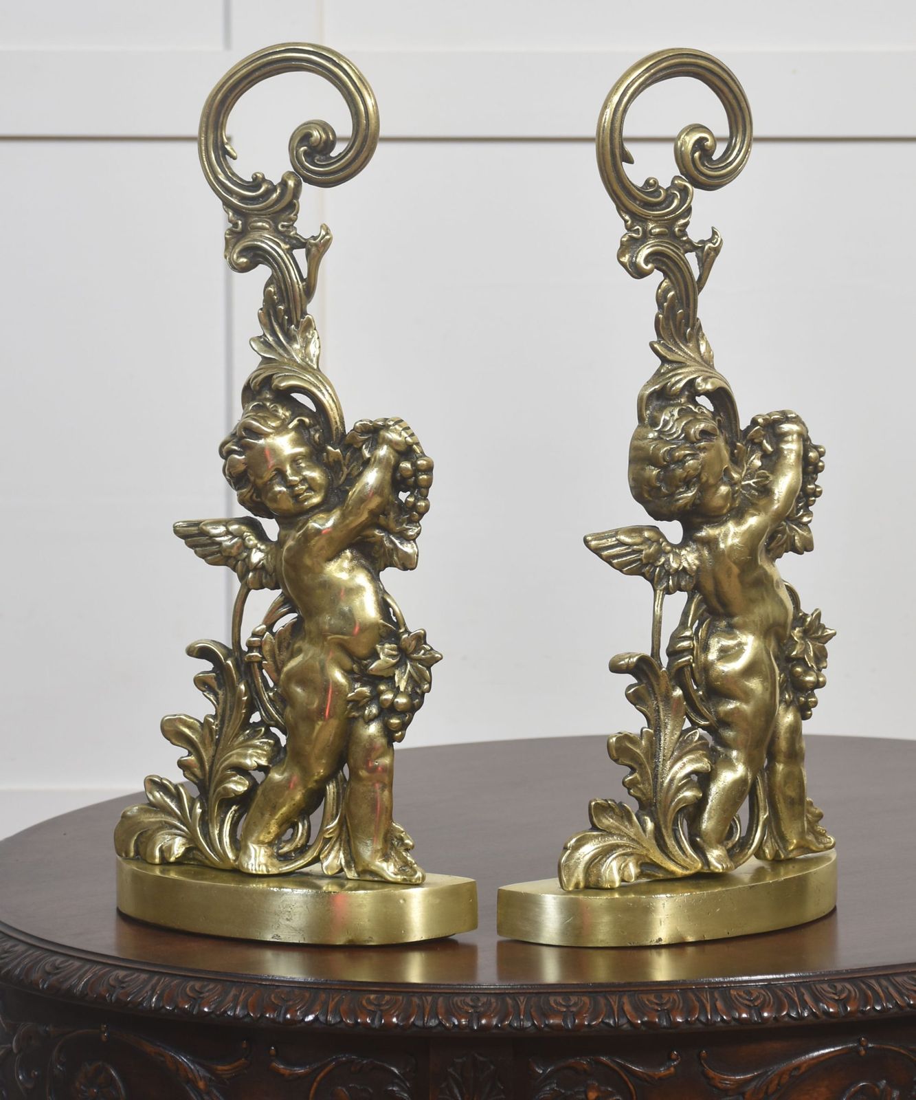 Pair Of Brass Putti Door Stops photo for sale