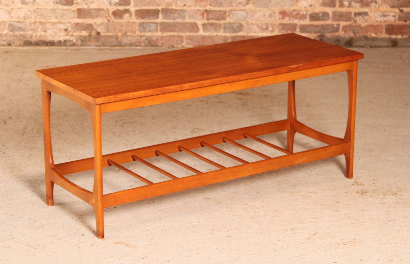 Mid Century Teak Coffee Table With A Magazine Rack, Circa 1960s photo for sale