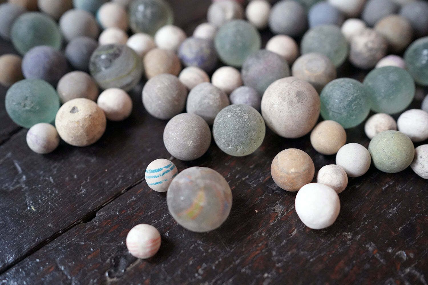 photo vinterior A Late 19thc Indian Marble Bowl Containing A Collection Of Clay & Glass Marbles