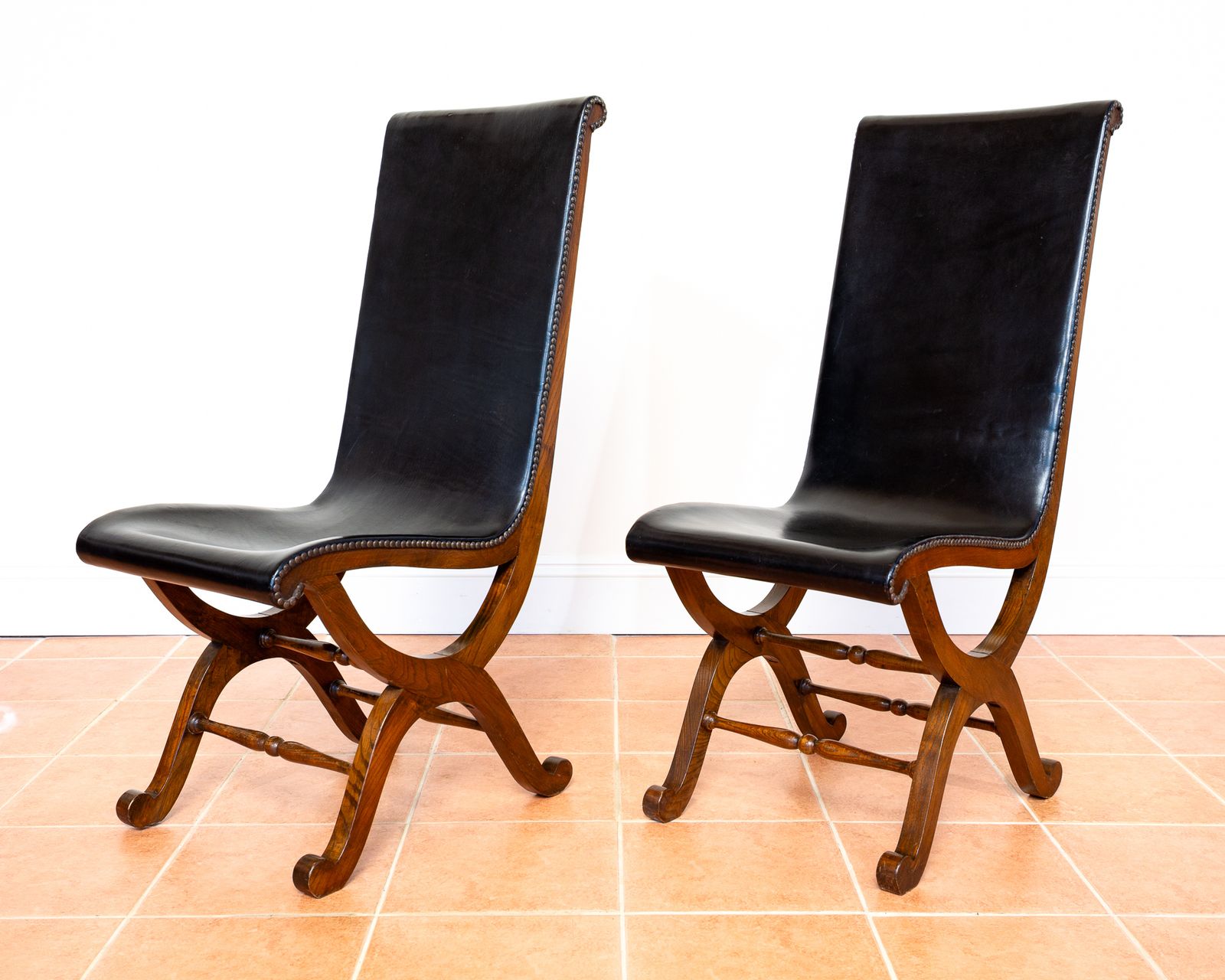 Pair Of Spanish Oak Leather Dining Chairs By Pierre Lottier Valmazan Mid Century Neoclassical Colonial 1960s Black Leather Sling Seat Studded Leather photo Furniture