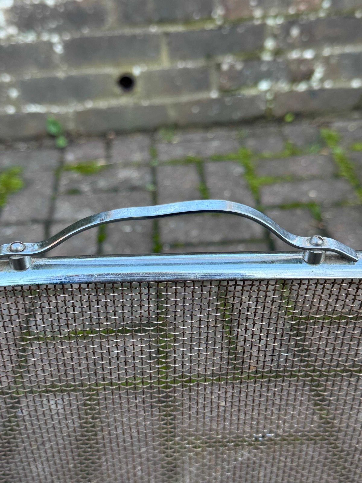 photo for sale Art Deco Metal Fire Screen With Curved Chrome Frame And Mesh Spark Guard