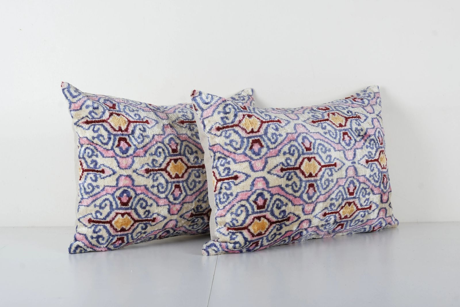 Pair Of Silk Velvet Ikat Pillows – Blue & Blush Geometric Cushion Covers photo Textiles
