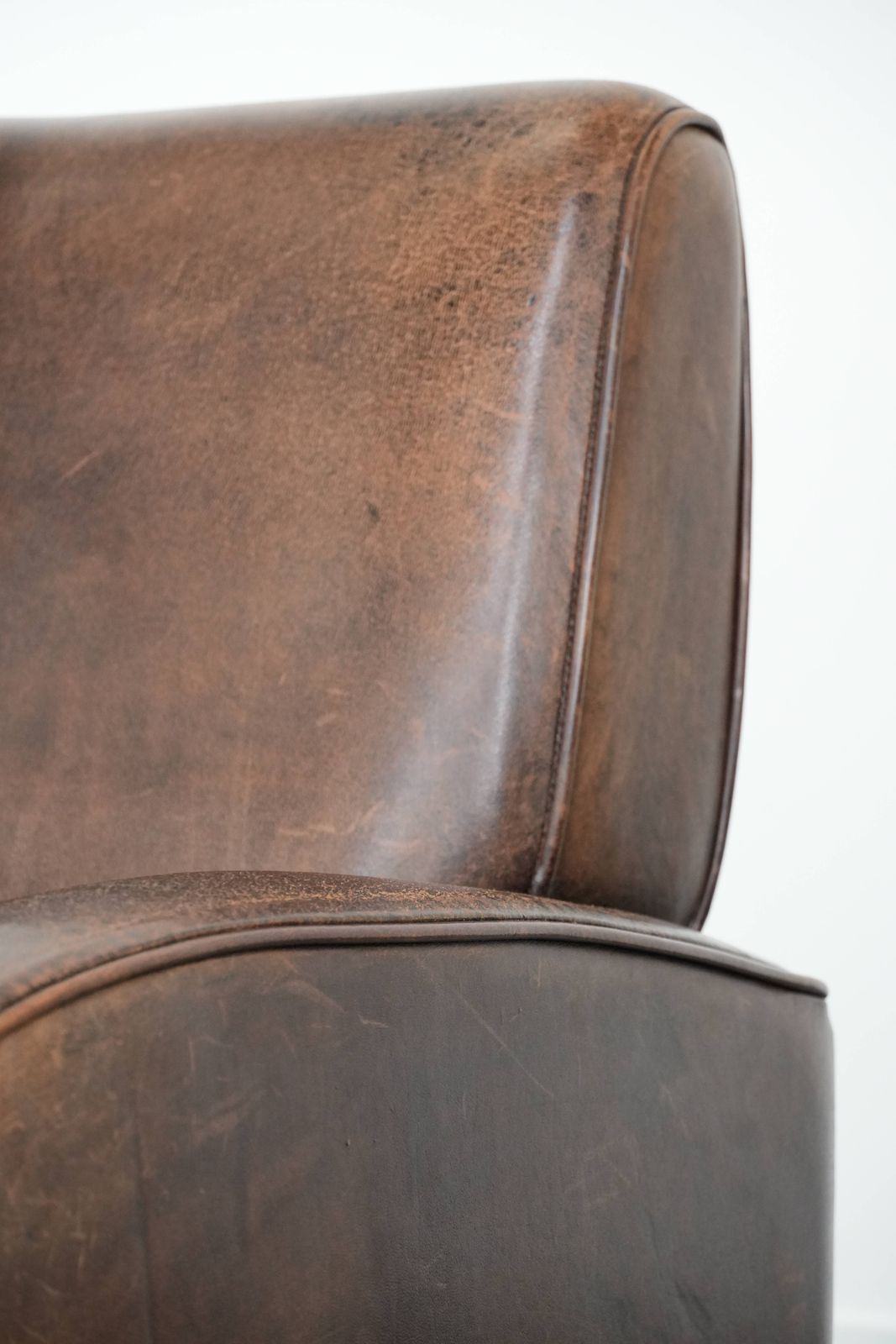 photo buy Sturdy And Timeless Vintage Sheepskin Armchair With A Round Design And Comfortable Seat