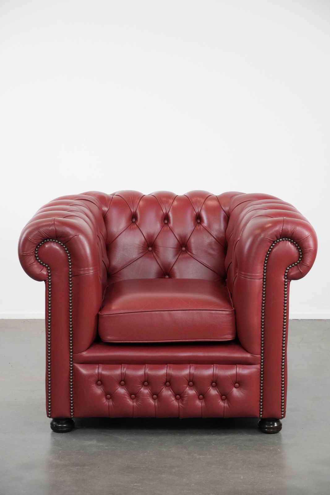 photo buy Wonderful Set Consisting Of An English Cowhide Chesterfield 2.5 Seater Sofa And Matching Armchair In A Stunning Red Colour