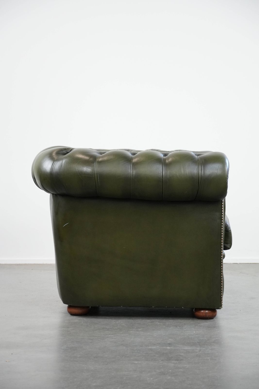 Beautiful Green Cowhide Chesterfield Club Armchair In English Style With A Classic Finish With Decorative Nails photo for sale