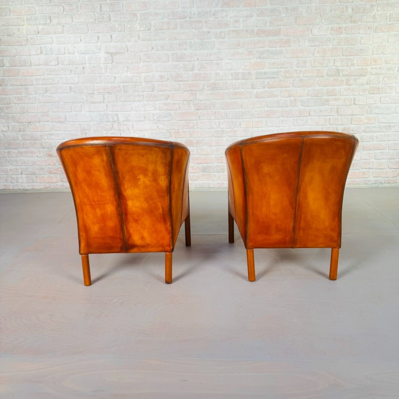 photo furniture Pair Of Vintage Danish Tan Leather Tub Chairs By Stouby #A815