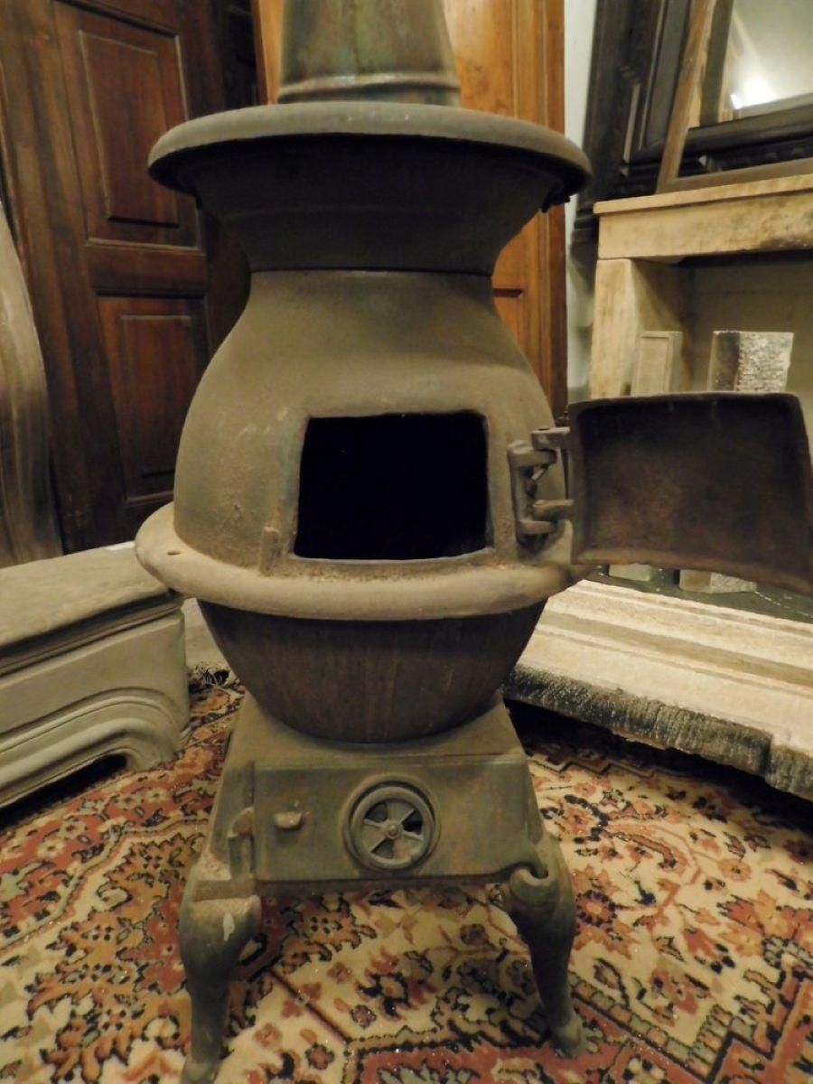 Dark Wrought Iron Stove, Typically From The Italian Valleys photo vinterior