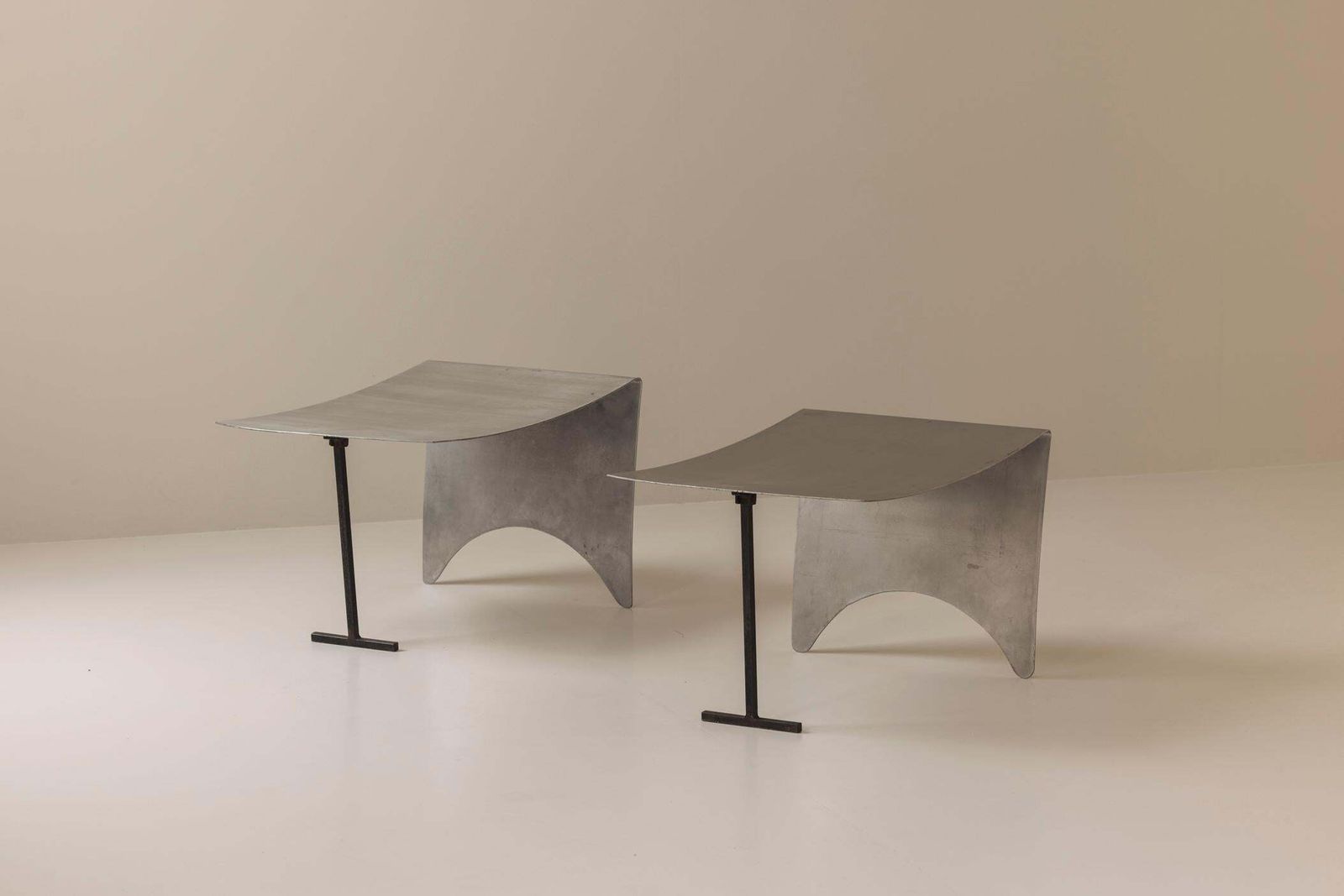 photo furniture A Striking Set Modernist Curved Metal Stools From France, Dating To The 1980s.