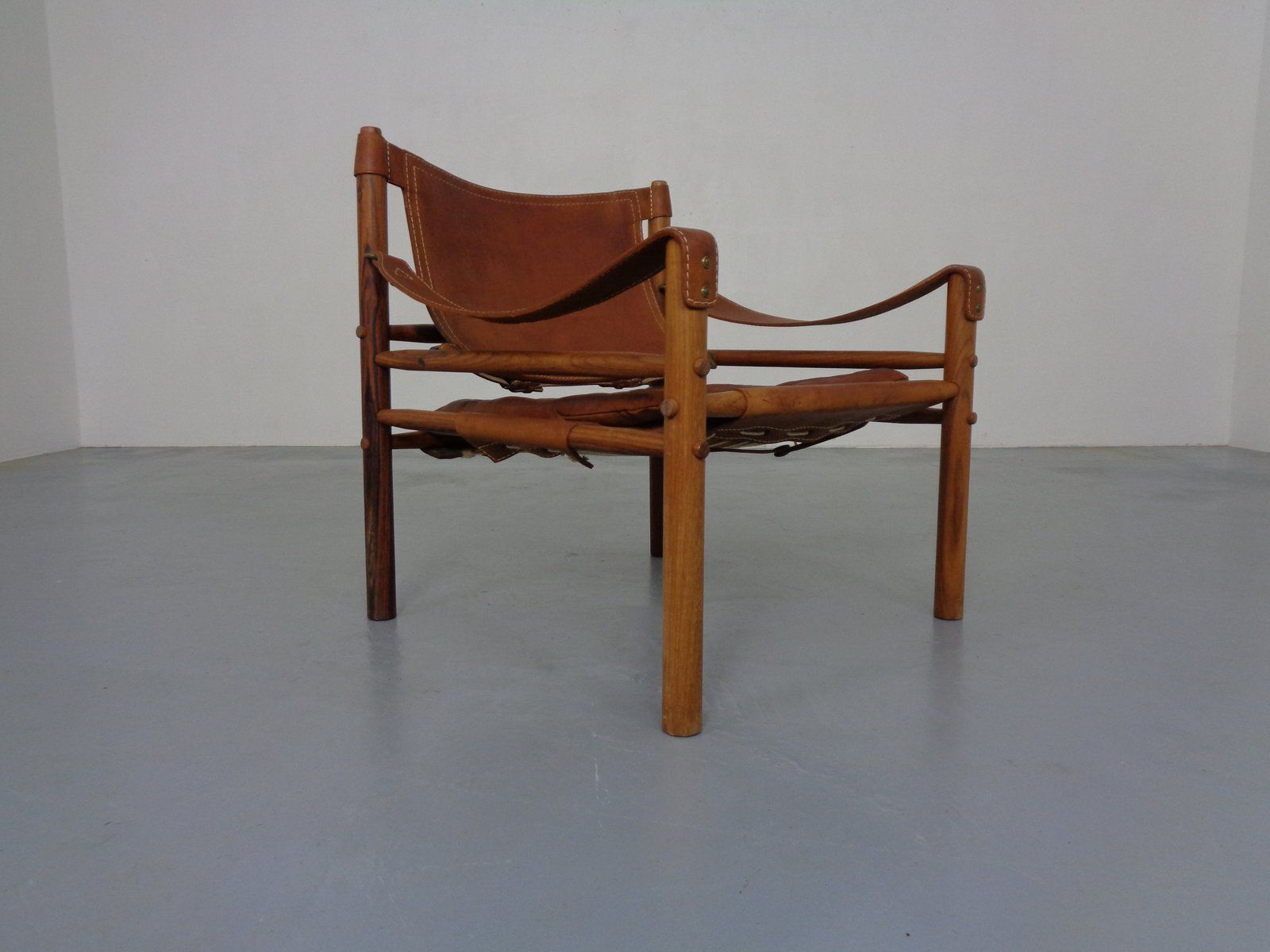 Sirocco Safari Chair In Rosewood And Leather By Arne Norell, Sweden, 1960s photo furniture