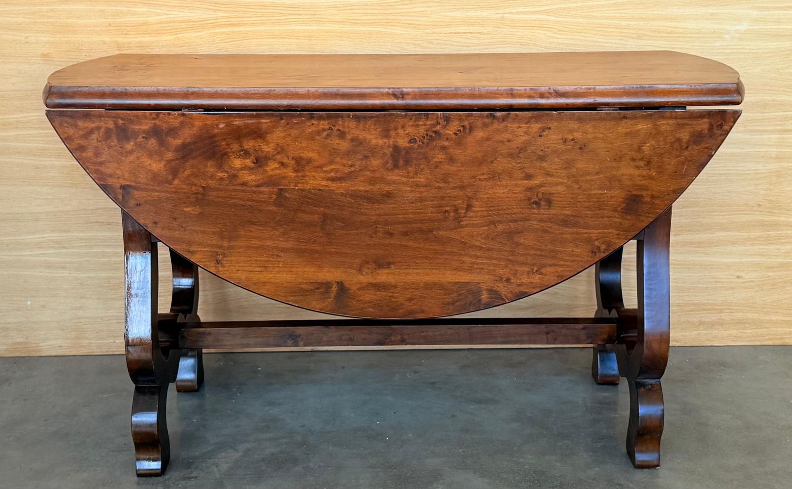 photo furniture Spanish 20th Century Walnut Drop Leaf Table With Round Top And Lyre Legs