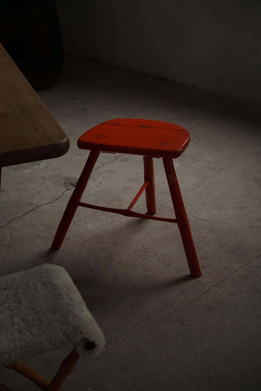 photo buy Pair Of Patinated Red Painted Wooden Stools With Splayed Legs, 1950s–1960s