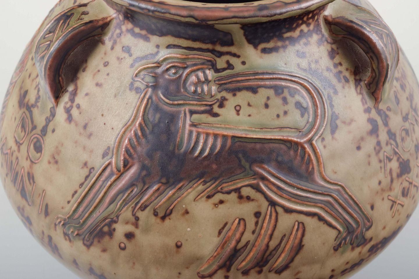 photo furniture Jais Nielsen, Royal Copenhagen. Ceramic Vase In Sung Glaze With Religious Motif