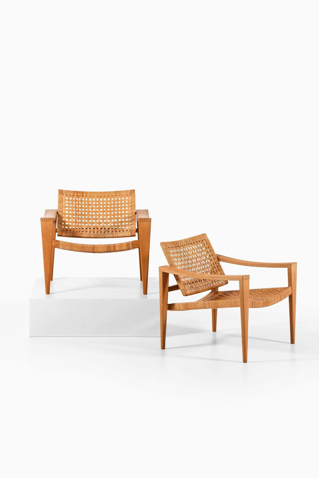 Pair Of Easy Chairs In Oak, Woven Cane, Brass And Leather By Hans Wegner, 1959 photo Furniture