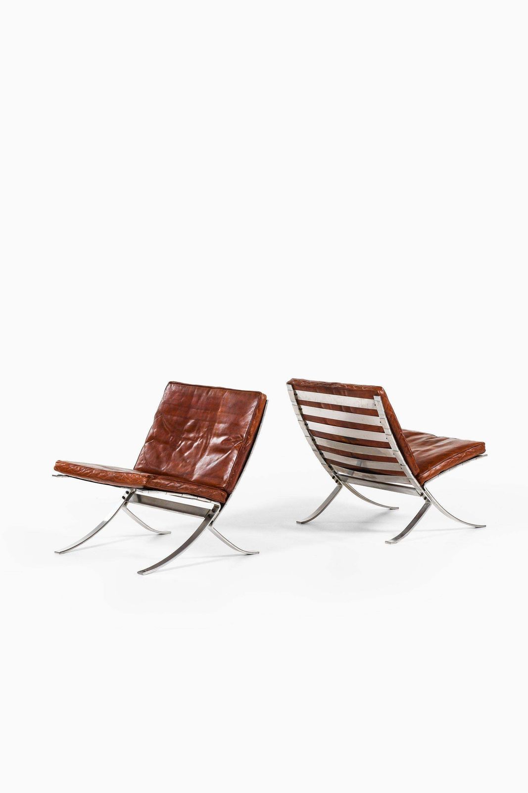 Pair Of Easy Chairs In Chromed Steel And Leather By Steen østergaard, 1960's photo furniture