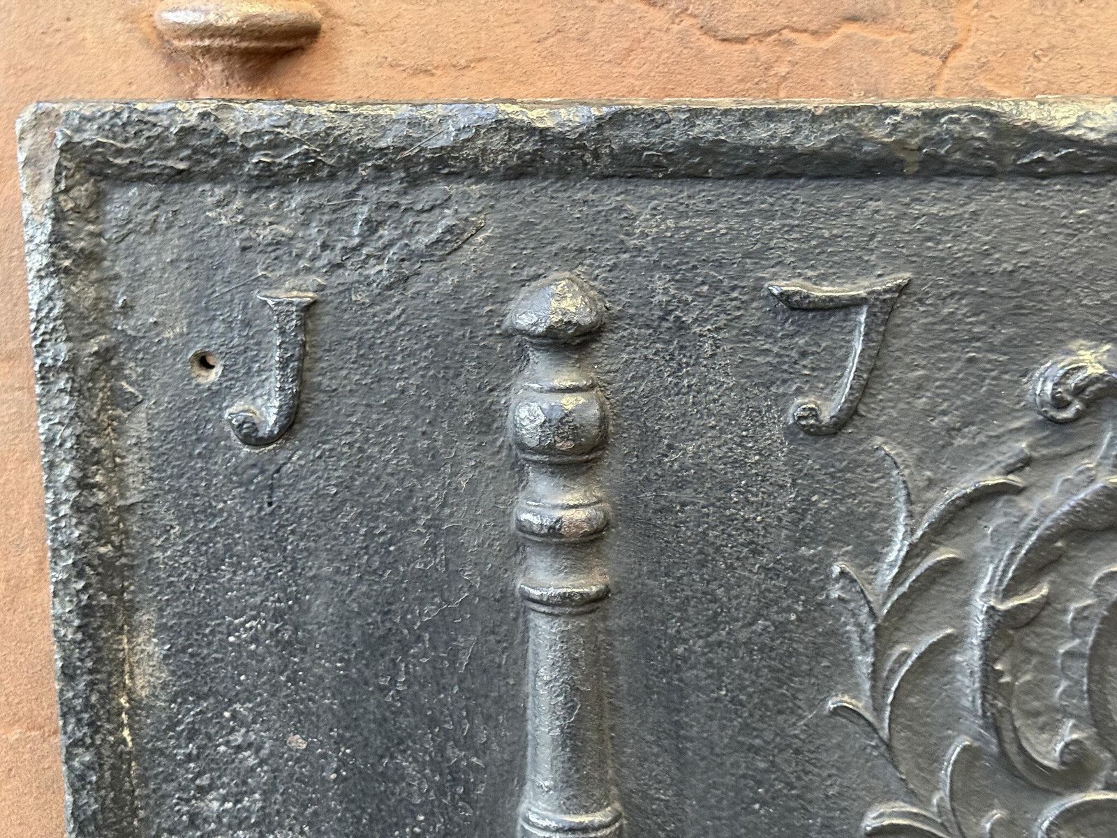 1279.0 18th Century French Fireback / Backsplash 'Pillars With Medieval Ihs Monogram' photo