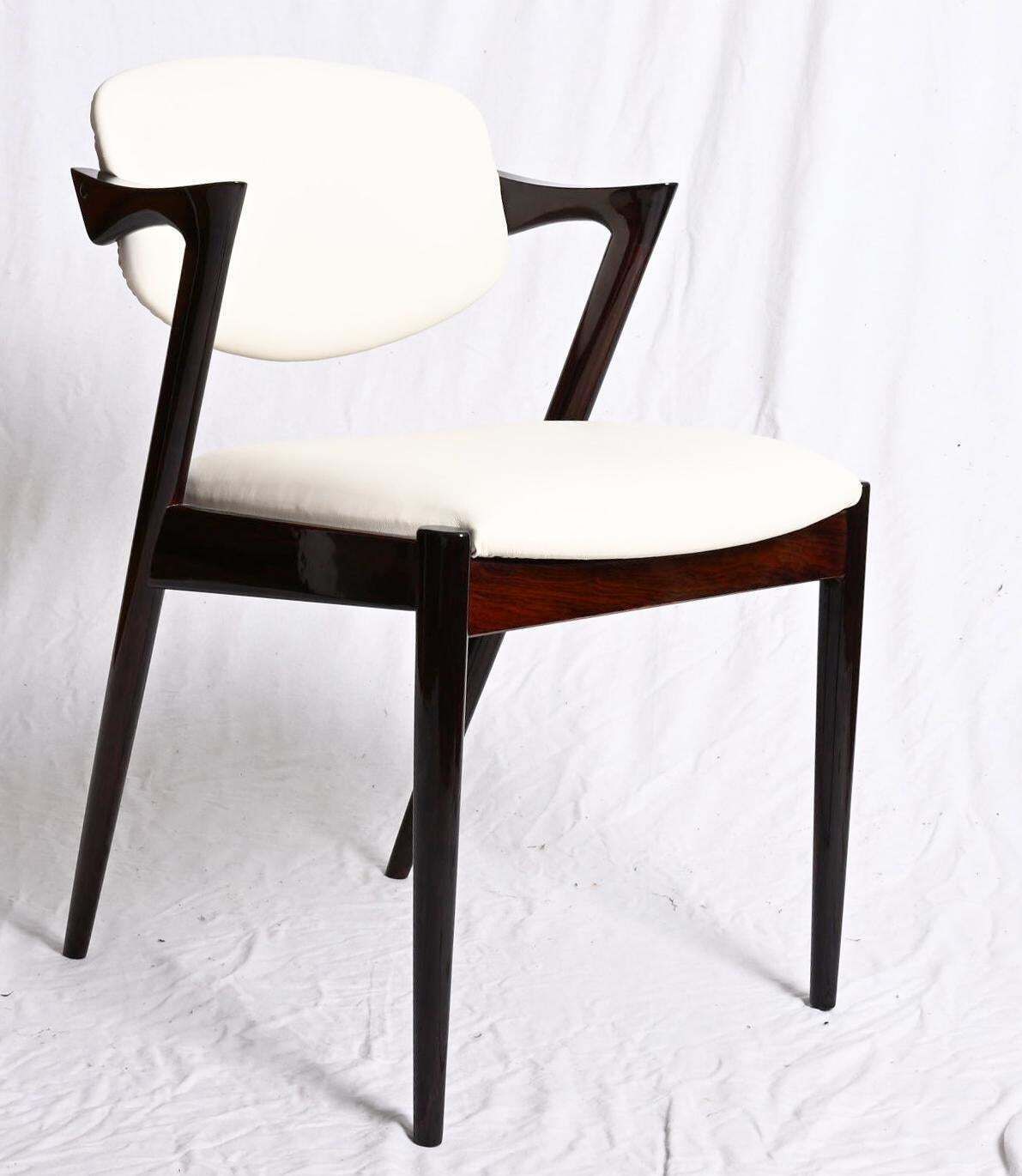 photo vinterior Hardwood And Leather Chairs By Kai Kristiansen Model 42