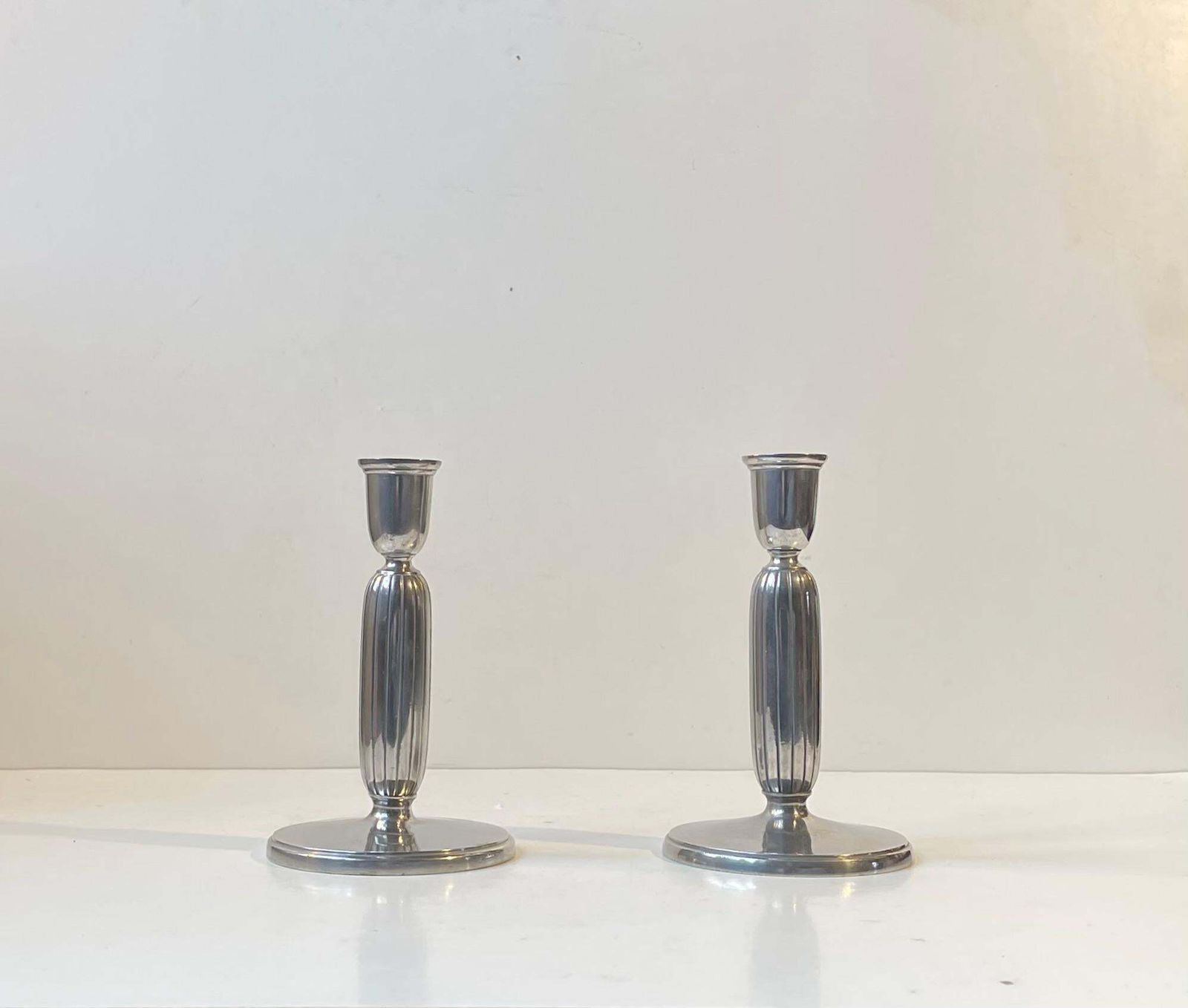 Just Andersen   A Pair Of Art Deco Column Candlesticks In Pewter, 1930s photo 526.0